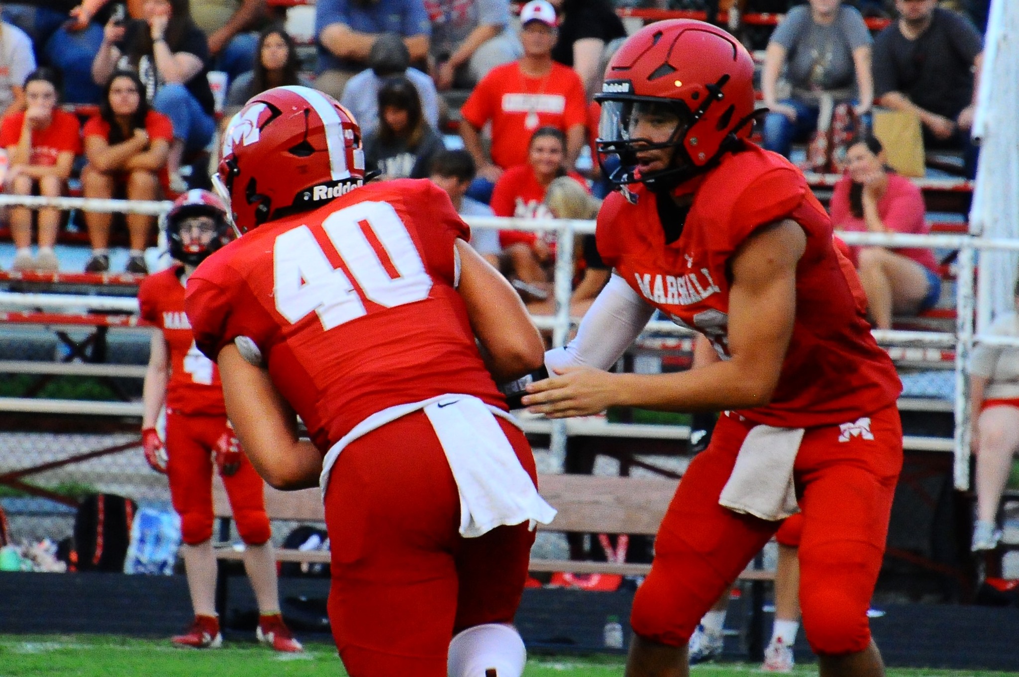 Marshall's Lucca Giannavola (40) takes the handoff against Tri-County in the Week 0 scrimmage. Photo by Tom Lisella.