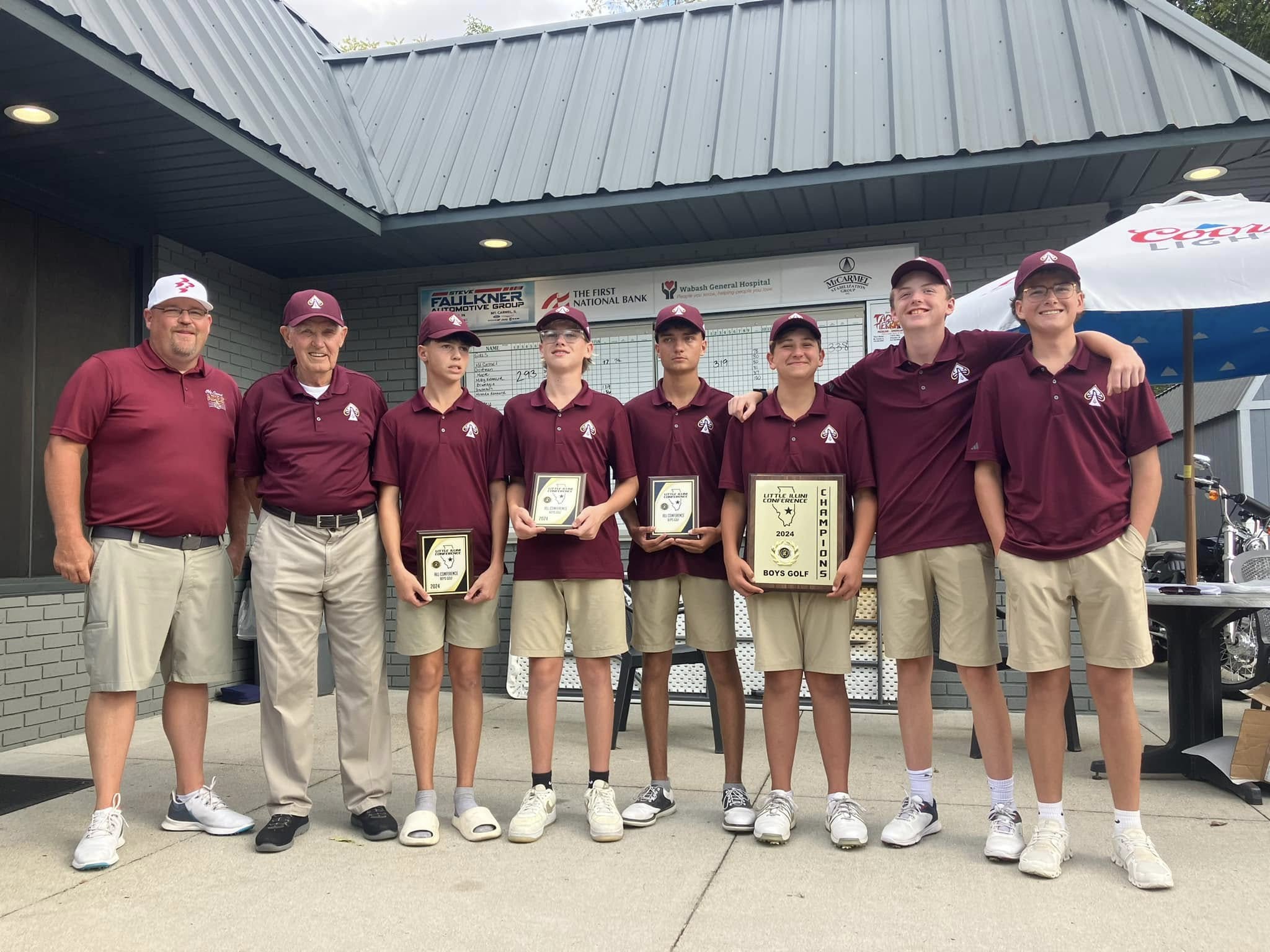 Mt. Carmel players and coaches gather after winning the LIC golf championship (courtesy photo).