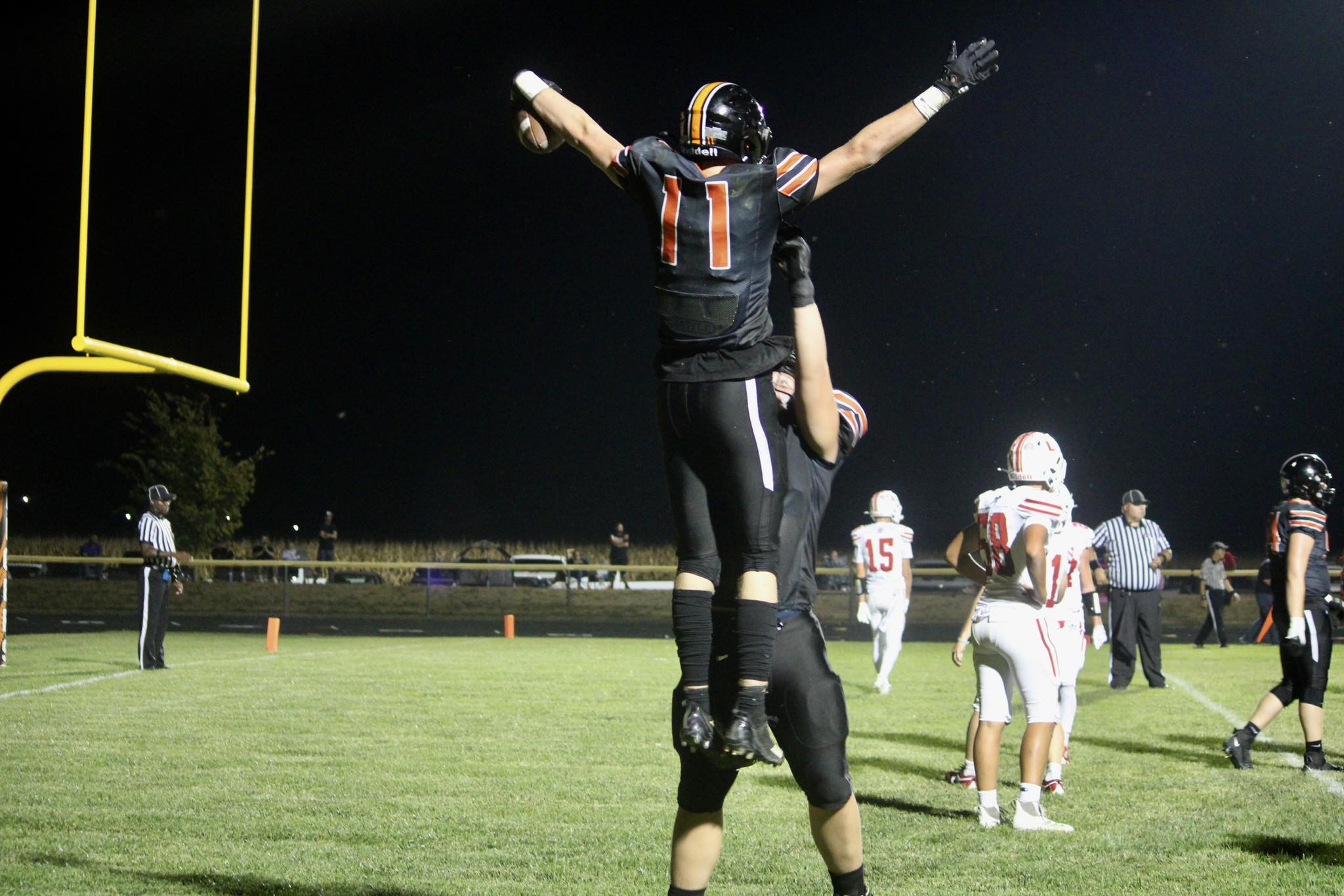 Dawson Rogers of Paris is hoisted into the air following a touchdown against Lawrenceville (Photo by Prairie Press).
