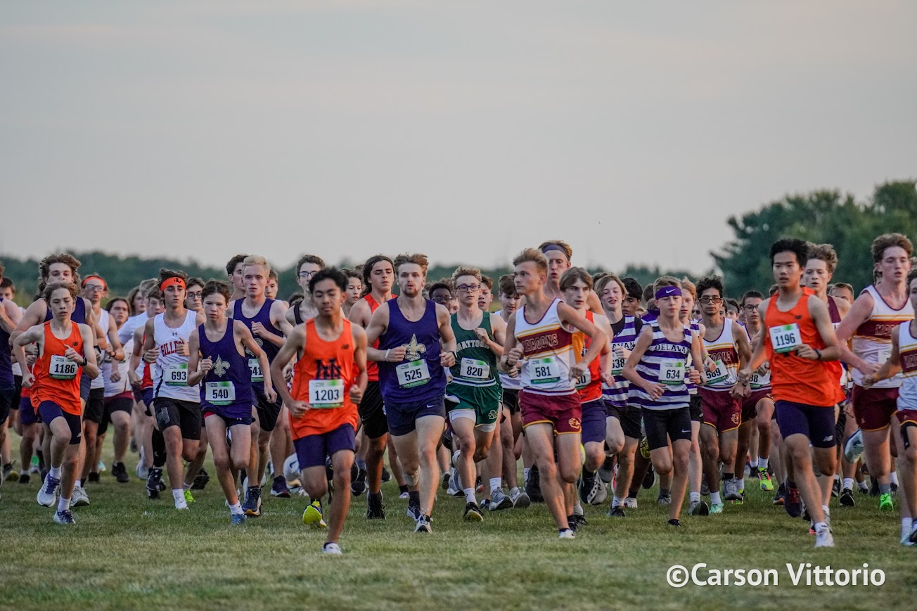 The start of the Light It Up Invitational in Clinton on Aug. 30 (photo by Carson Vittorio for Illinois Running News).