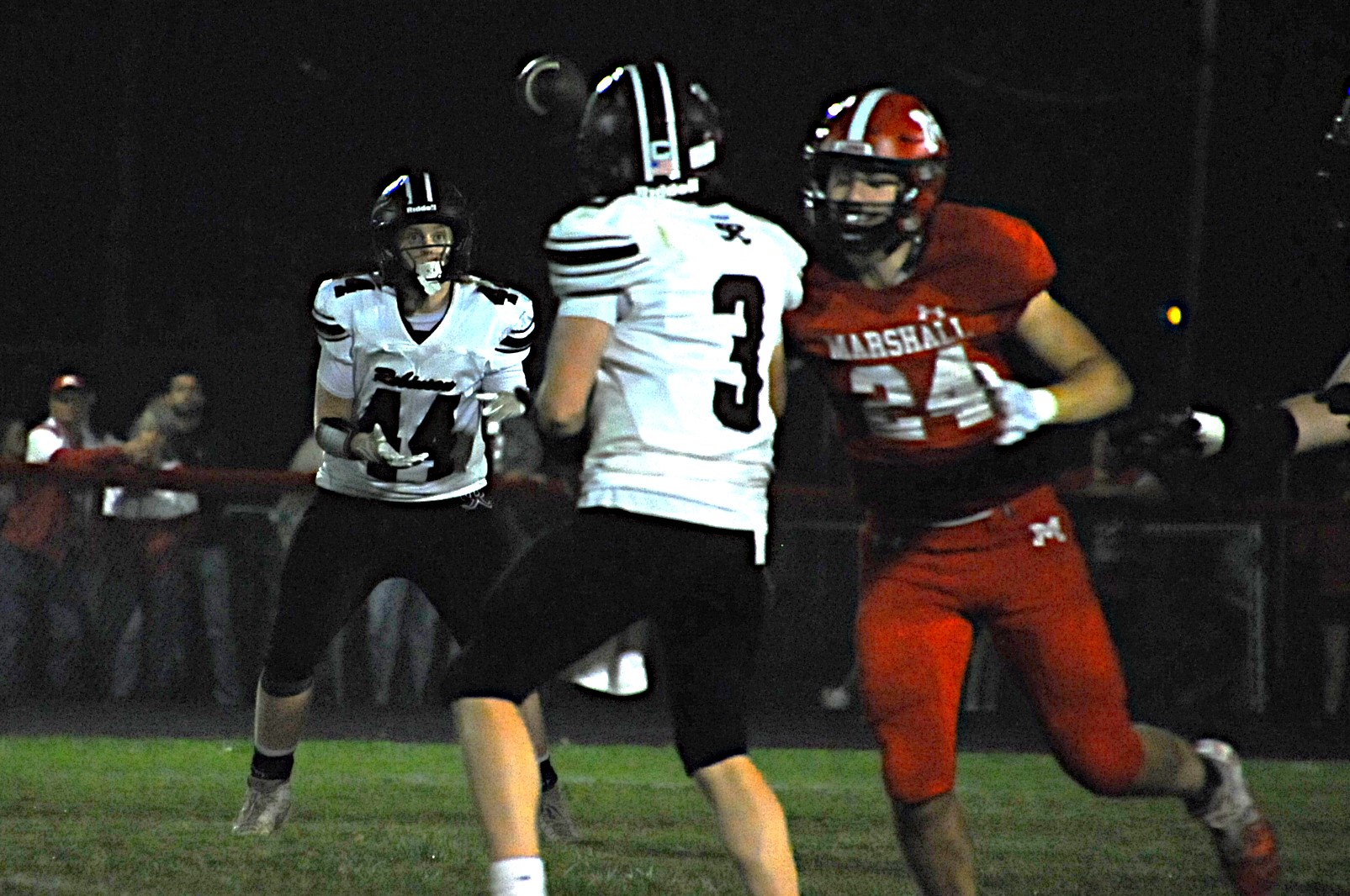 Robinson's Isaac Ayers (44) looks to catch a pass from quarterback Reese Johnson during a game against Marshall (Photo by Tom Lisella).