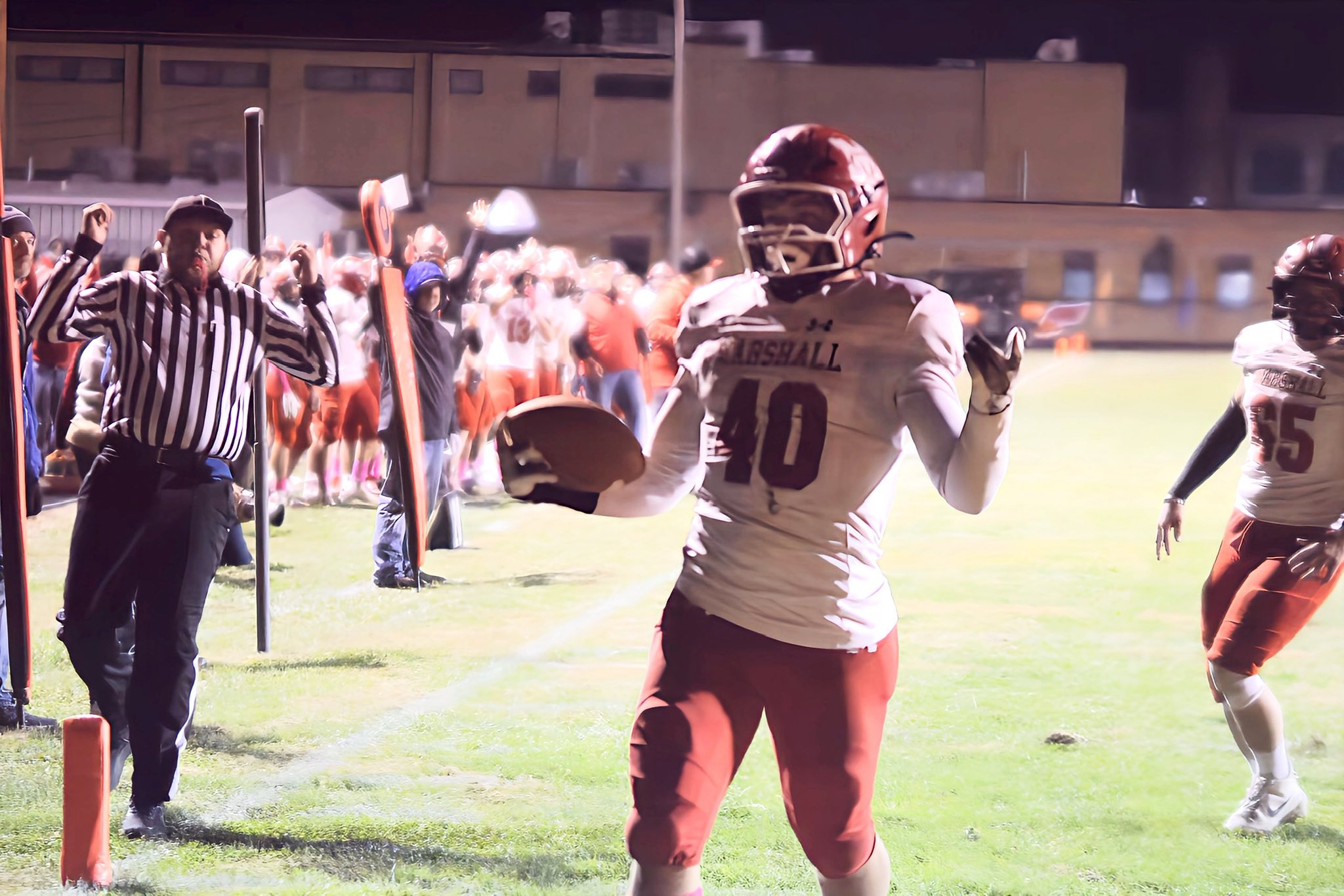 Marshall RB Lucca Giannavola scores a touchdown vs. Newton on Oct. 24 (photo by T. Ray Henry for WMMC).