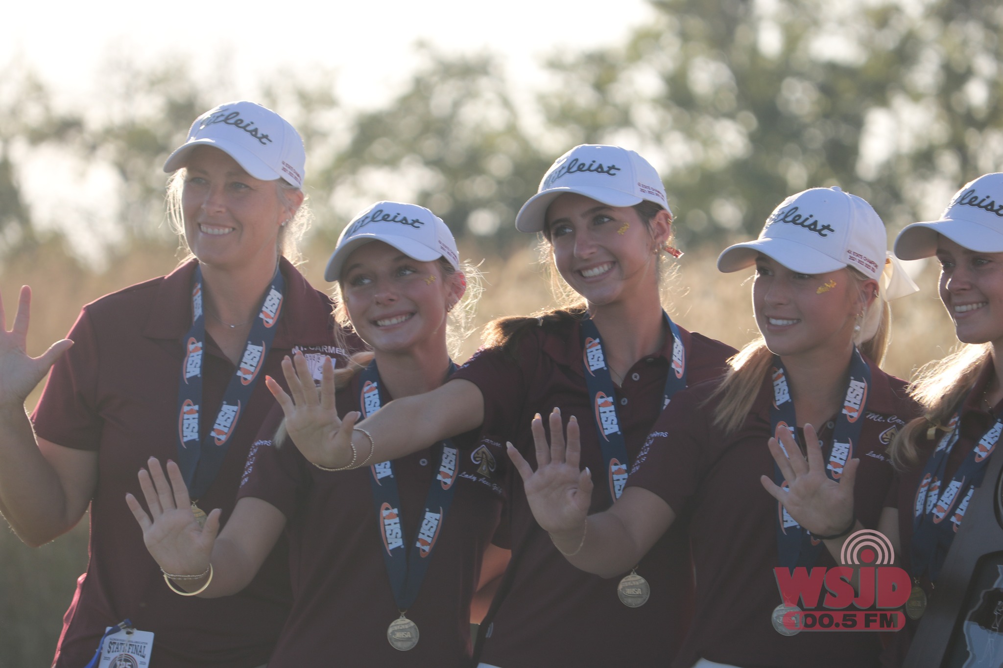 The Mt. Carmel Lady Aces celebrate their fifth straight state golf championship (WSJD photo).