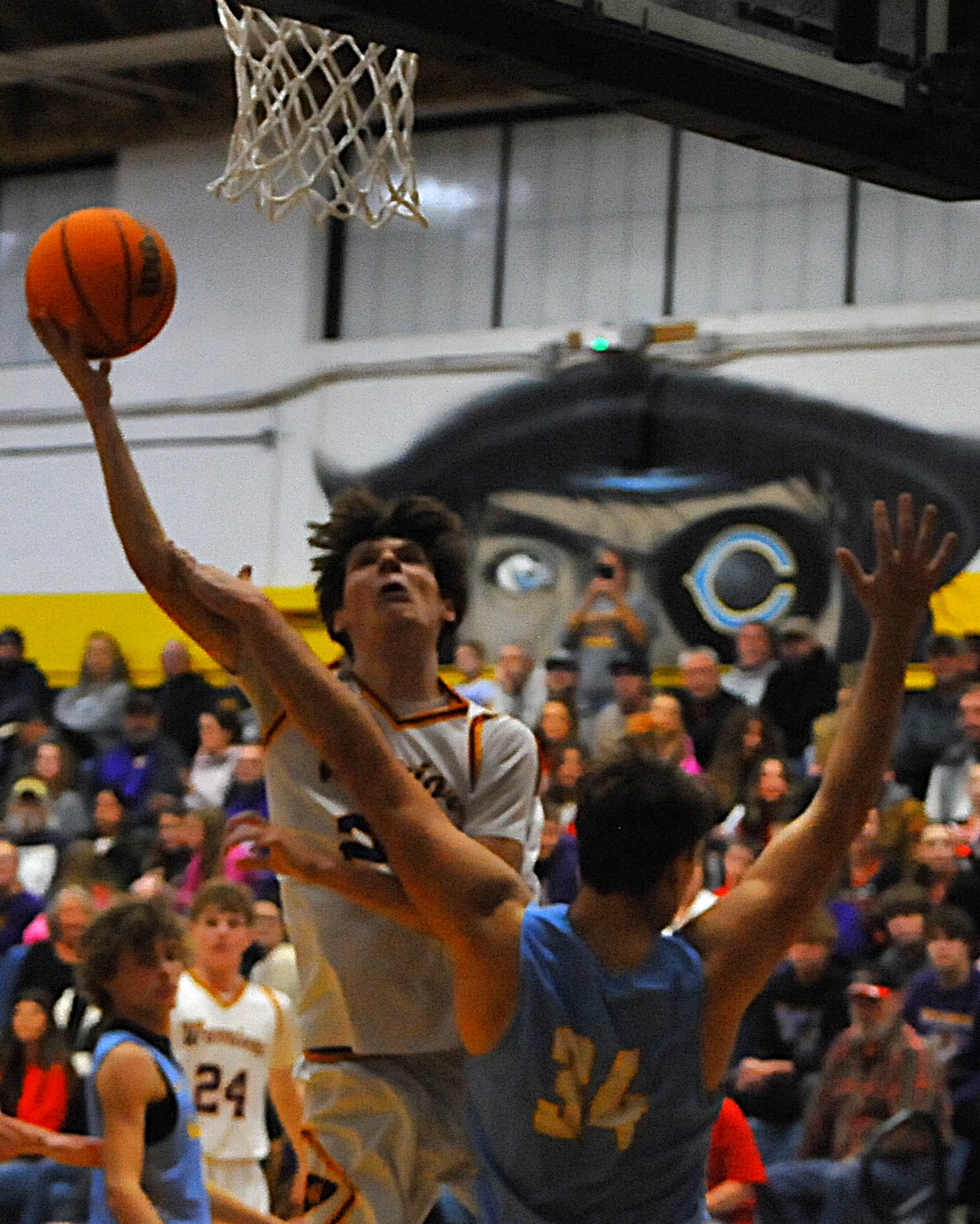 Leighton Jones of Casey-Westfield drives for the basket against Cumberland (Photo by Tom Lisella).