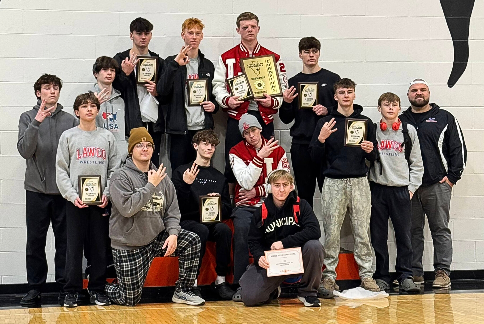 Lawrenceville celebrates its' 3rd straight LIC wrestling championship (courtesy photo).