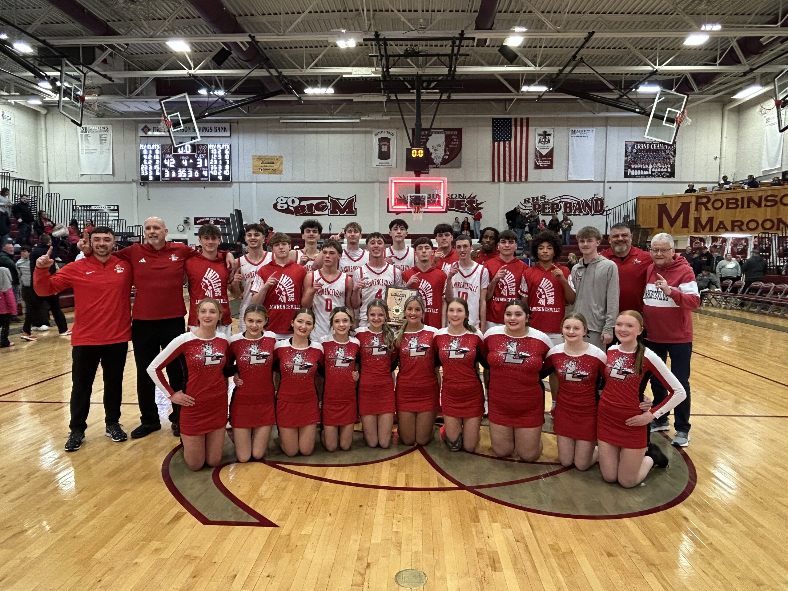 The Lawrenceville Indians won their second straight LIC boys basketball title on Friday night in Robinson (Photo by Josh Brown).